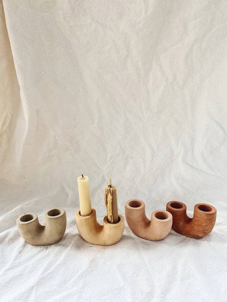 rising taper candle holder